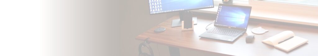 Desk with computer and monitor